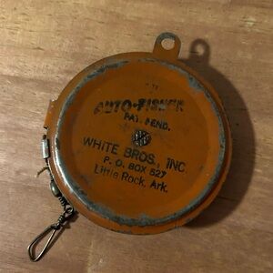 Vintage Orange Auto-Fisher Reel